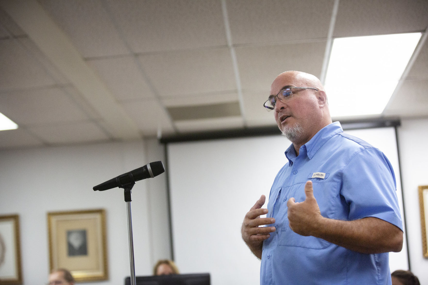Virtus Group representative addresses commissioners